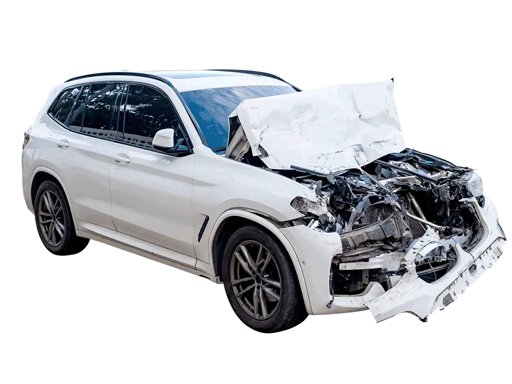 Damaged white SUV ready for scrap car recovery